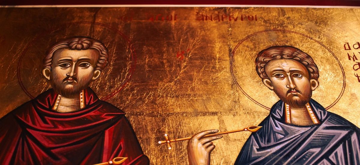 Beautiful traditional Orthodox icons depicting saints in a church setting.